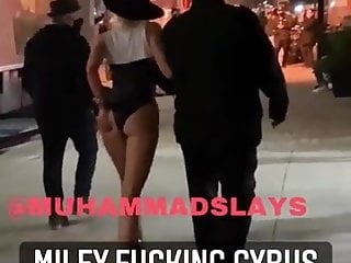 Miley Cyrus spanks her perfect ass onset of music video