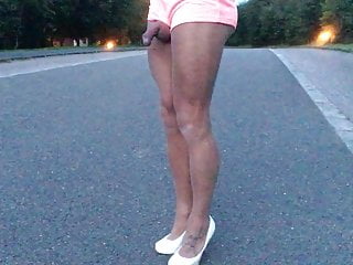 Public road walk in pink shorts . 