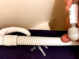 Hand Massager Vibrator Pressing A Small Penis On A Vacuum Cleaner Hose And Cumming On It