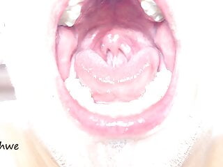 Delicious wide open mouth with lots of saliva