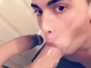 Andrew sucking on a large dildo