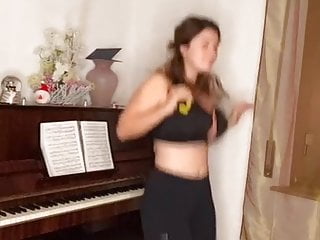 Girl jumping and bouncing her big breasts