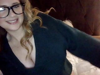 Girl in glasses teases then fucks pussy with toy.