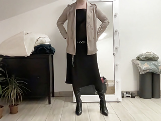 Black satin fetish long dress and silk jacket and high heels overknee boots and my cock hard and horny. Suck me gently