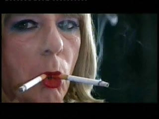 T-Girl Samantha Is Made To Smoke Two