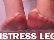 Mistress Leg washing nylon feet from the chocolate topping