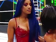 WWE - Sasha Banks in hot red outfit looking out for Bayley