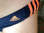 Me in Adidas swim brief dark blue with orange stripes