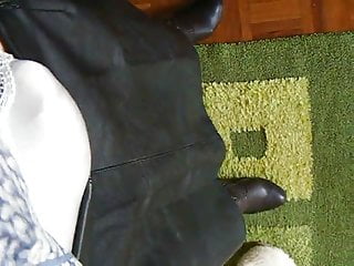 Satin panties,leather skirt and high boots.