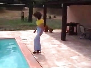 Marjorie is getting wet in her pool - outdoor