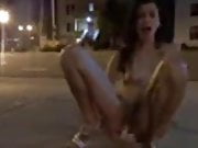 Woman masturbating in the street