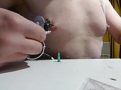 E-STIM in piercing tit  and in tit with needle Pov