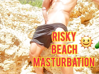 Sexy guy masturbating his big cock in a public beach – Almost Caught
