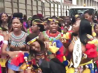 Topless African girls group dance on the street