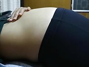 Asian girl's huge sloshy belly
