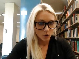 Cute blonde college girl flashing in the library