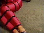 Spandex girl has feet and toes taped