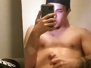 Guy Showing In Front Of The Mirror