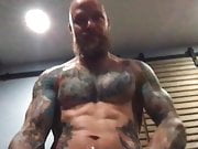 tatted bearded muscle daddy pumps out a load