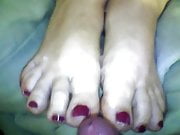 footjob wife red toenails