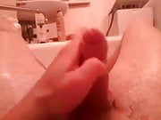 Wanking and cumming in bathtub