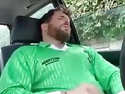 bear cub shooting a hot load on his sports kit in the car
