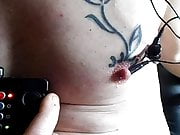 E-stim directly inside pierced nipple