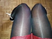 Red latex mini skirt, black tight and White heels