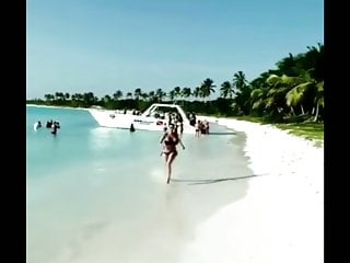 Huge boobs running on beach