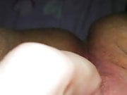 Horny milf fingers her pussy close-up