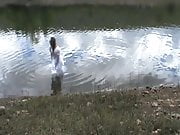 big wedding gown in a lake