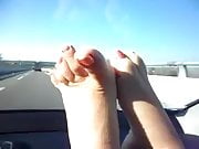 delicios feet in car trip