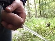 Uncut cock pissing in the woods