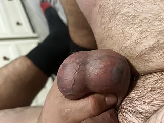 Ball bondage and pinged with elastic band and hit with a comb whilst tied 