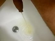 Me pissing in bathtub