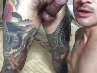 asian sucking his whole-body tattooed friend (1'02'')