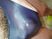 Jerking it in a soaked satin thong 