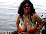 38DD Mature Busts Out Of A Beer Bikini