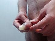Playing and cumming in a used condom with sound