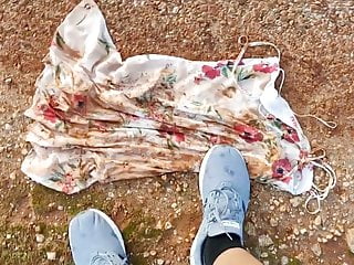 floral 10 dress in mud puddle and then clean shoes on it