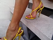 6 Putting on yellow strappy high heel sandals & zooming in.
