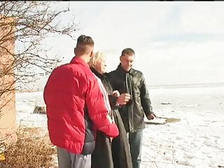 Irina with two guys on the snow